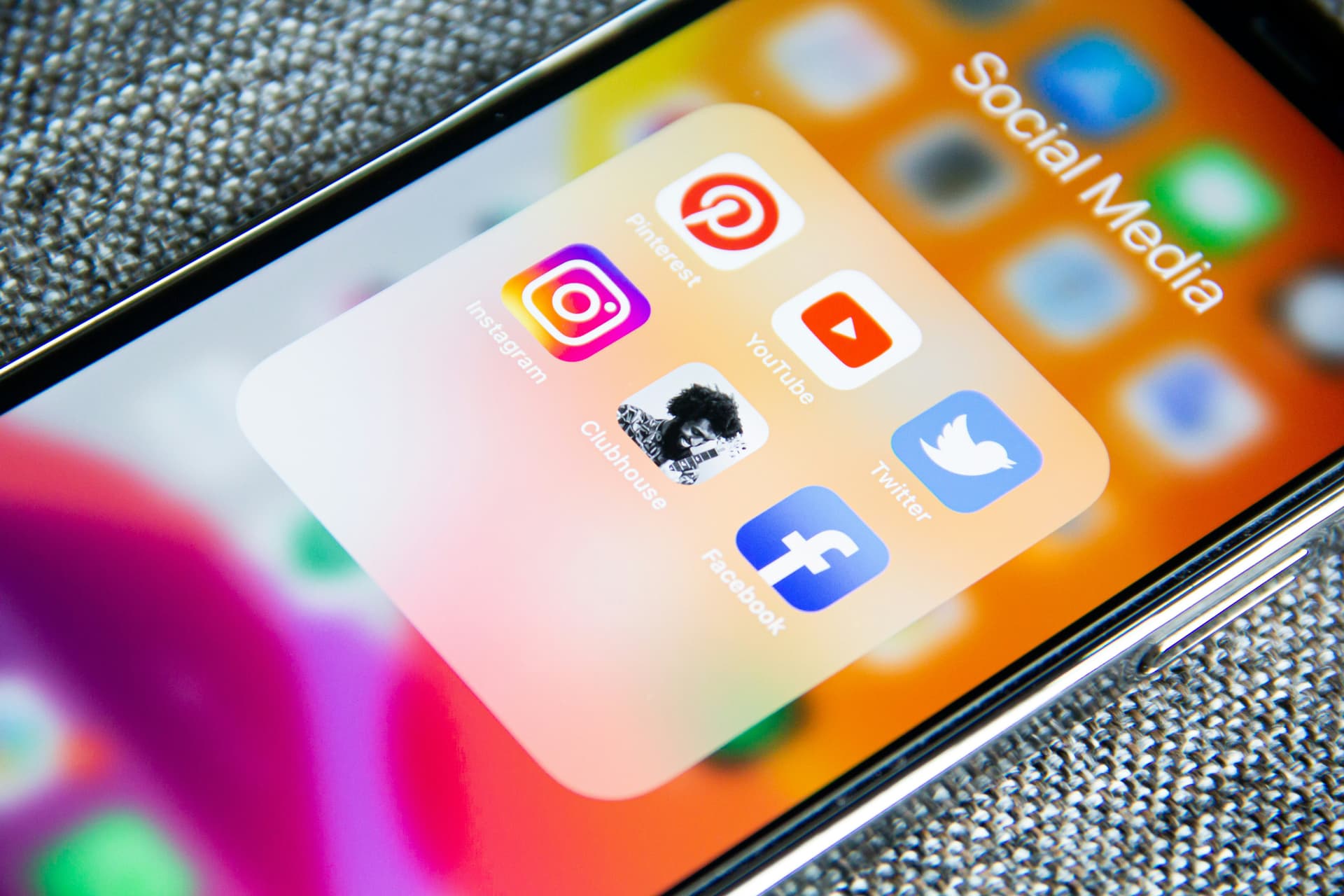iPhone showing a social media apps folder, professional social media management in Middlesbrough